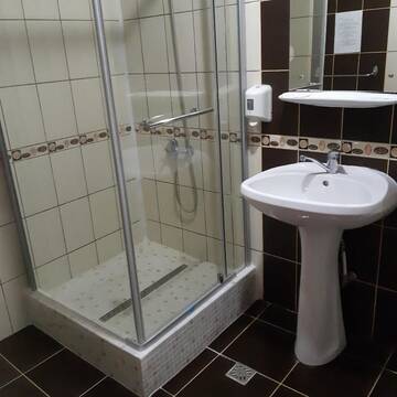 Фото номера Двухместный номер с 1 кроватью или 2 отдельными кроватями Гостевой дом Pensiunea Octogon г. Пьятра-Нямц 17