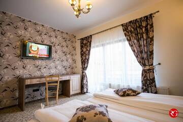 Фото номера Номер с кроватью размера «king-size» и балконом Гостевой дом Pensiunea Royal Spa г. Пьятра-Нямц 6