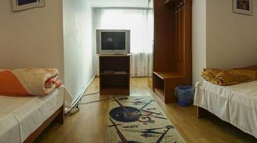 Фото номера Семейный номер Гостевой дом Pensiunea Ilinca г. Пьятра-Нямц 5
