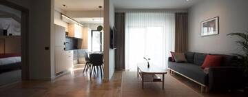 Фото номера Апартаменты Делюкс с 1 спальней Отель Atlas Aparthotel г. Пьятра-Нямц 19