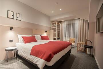 Фото номера Апартаменты Делюкс с 2 спальнями Отель Atlas Aparthotel г. Пьятра-Нямц 4