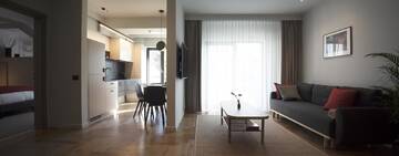 Фото номера Апартаменты Делюкс с 1 спальней Отель Atlas Aparthotel г. Пьятра-Нямц 6
