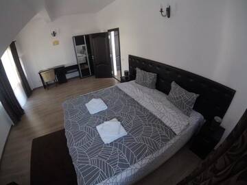 Фото номера Люкс с 1 спальней и балконом Проживание в семье Cochet Accommodation г. Пьятра-Нямц 3