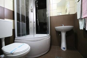 Фото номера Трехместный номер Делюкс Мотели Motel Aris Meridian г. Пьятра-Нямц 3